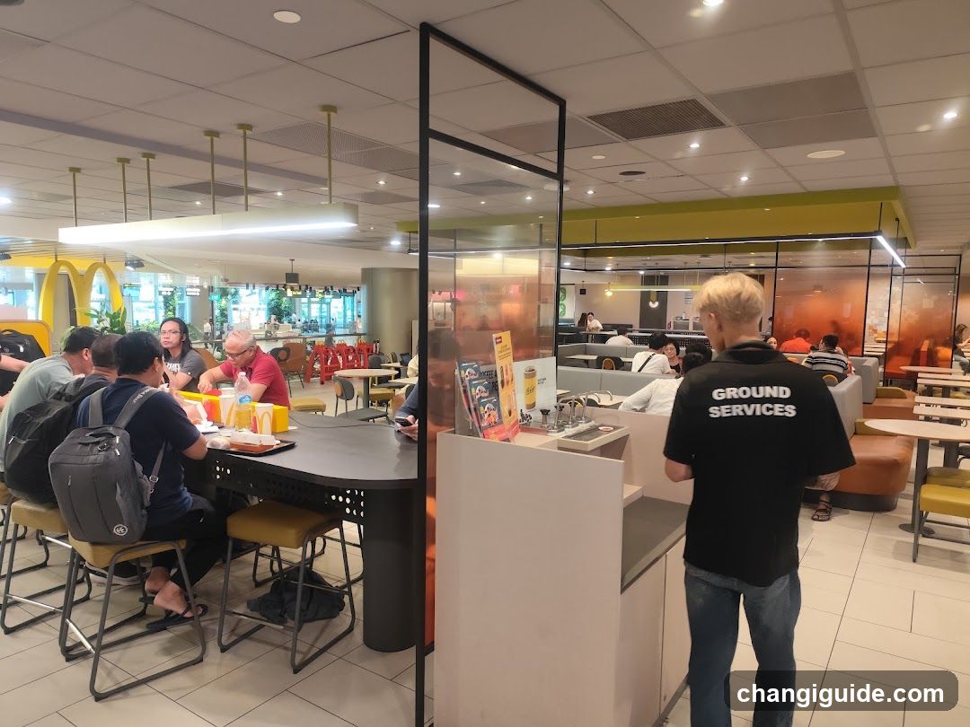 Food Court Interior with Staff and Customers