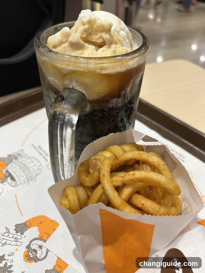 Curling fries and iced coffee drink