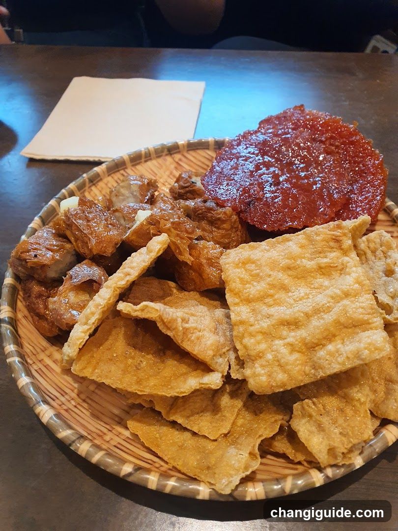 Bowl of Fried Snacks and Preserved Meat