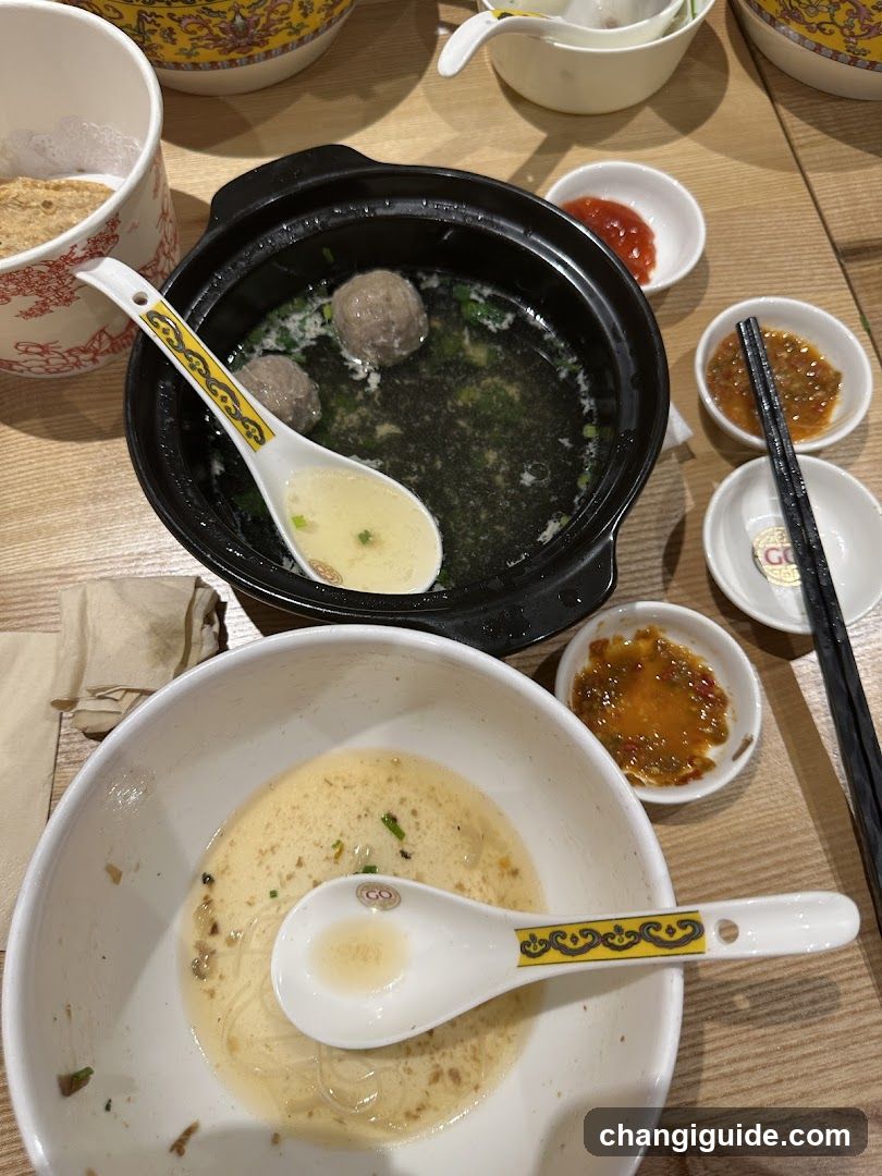 Dining Table with Soup and Noodles