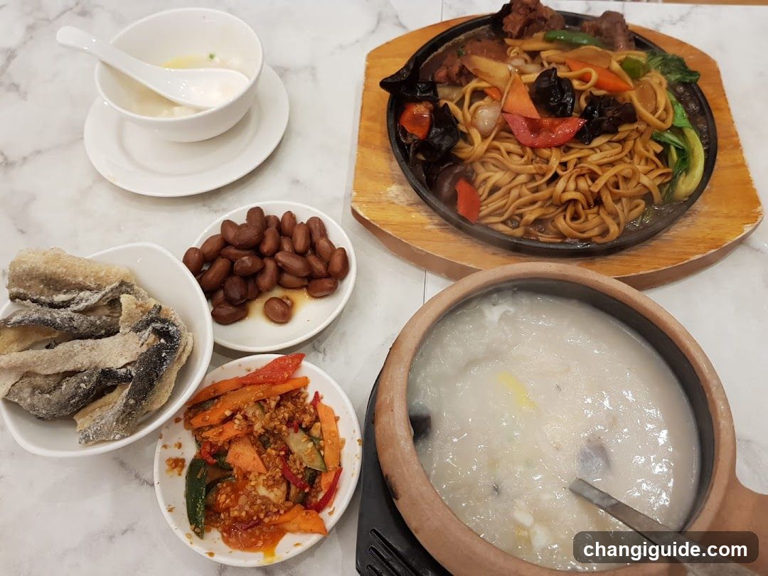 Breakfast Spread with Noodles and Porridge