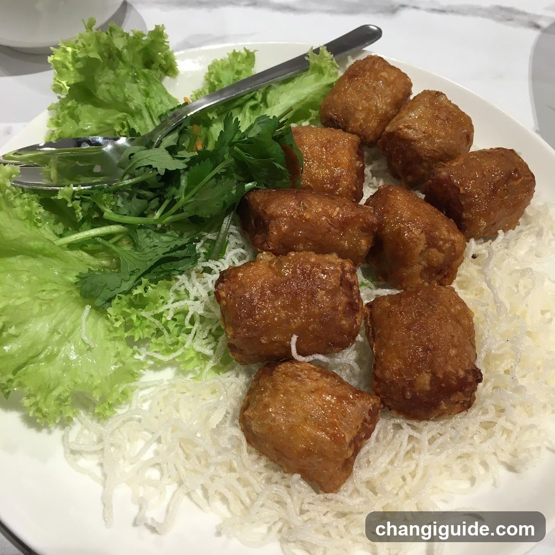 Fried Cakes with Noodles and Greens
