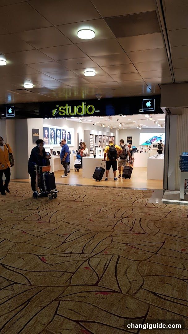 Apple Store Interior with Travelers
