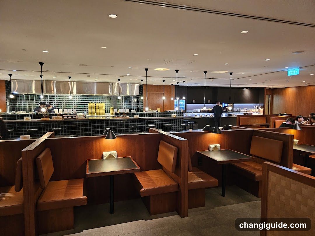 Restaurant Interior with Booth Seating and Kitchen View