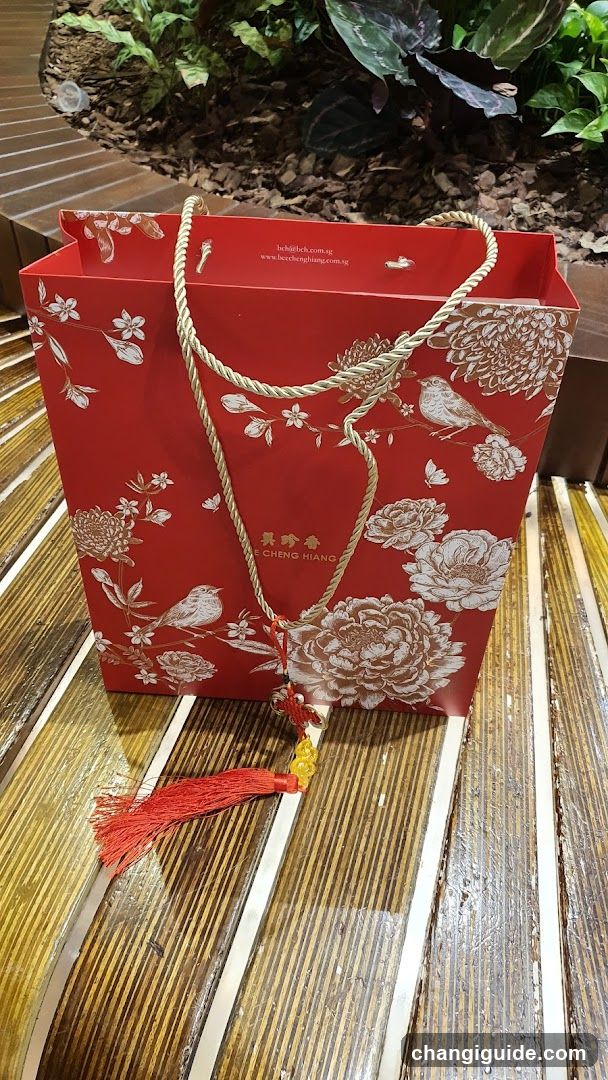 Red Gift Bag with Floral Design