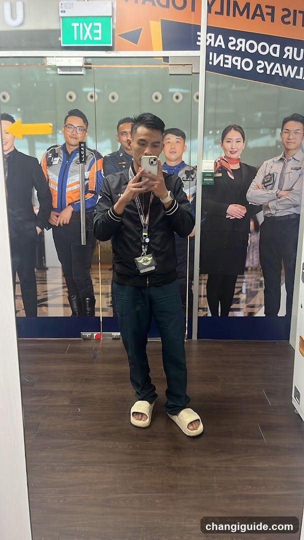 Mirror selfie in a commercial building entrance