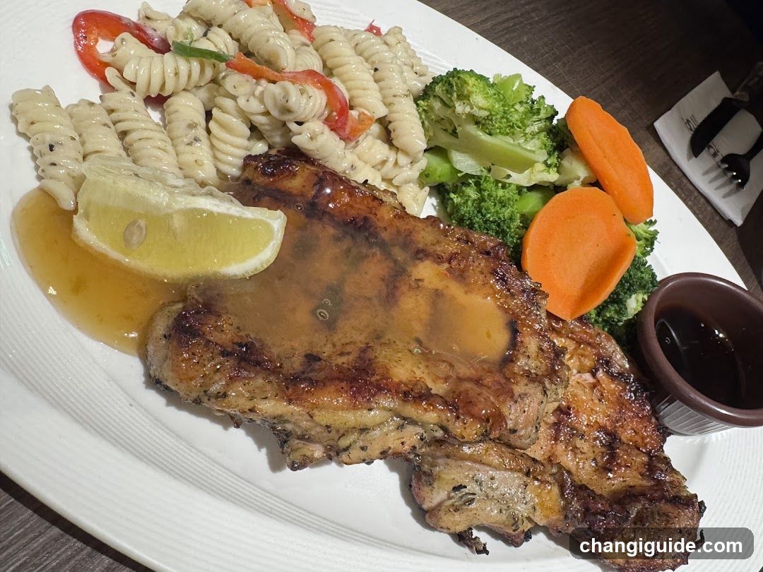 Grilled Pork Chop with Pasta and Vegetables