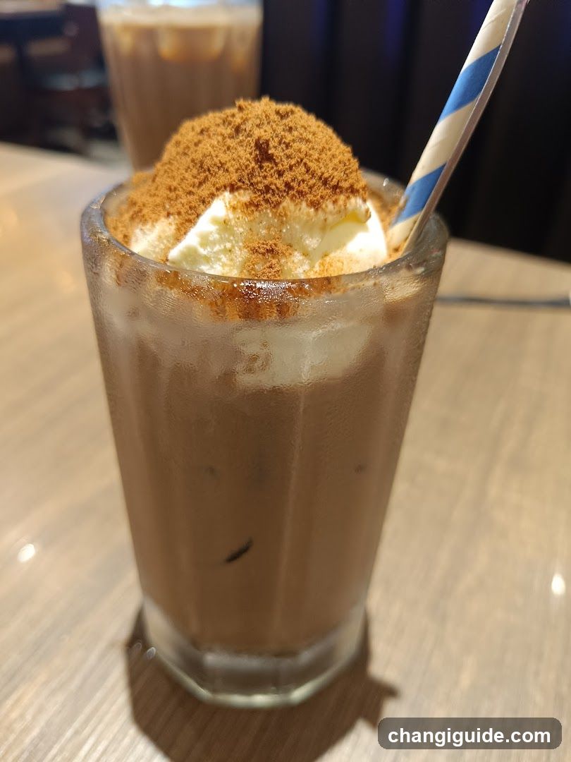 Iced Coffee with Whipped Cream and Cinnamon
