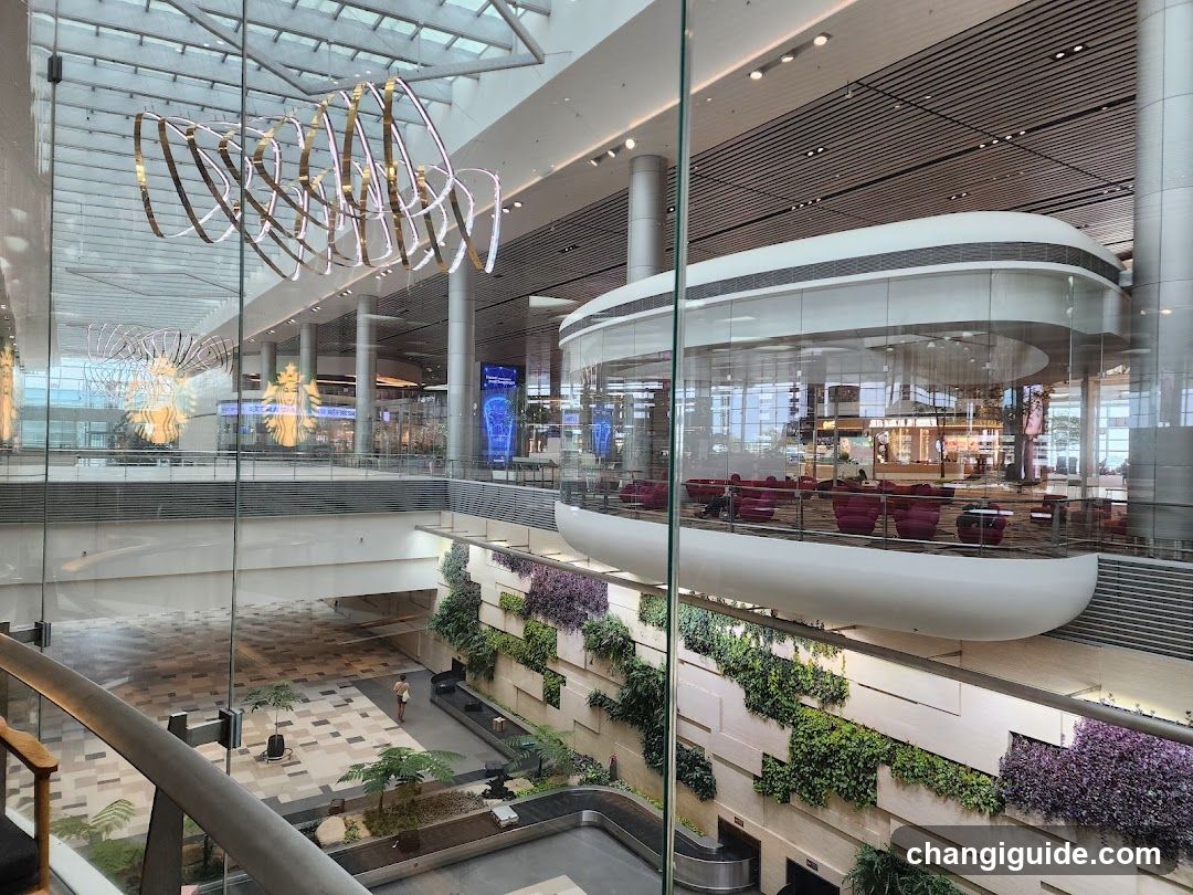 Modern Airport Interior with Greenery and Art Installations