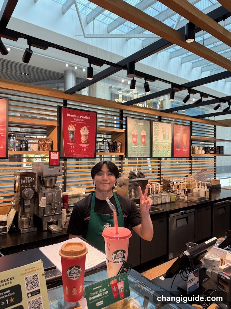 Starbucks Barista with Drinks