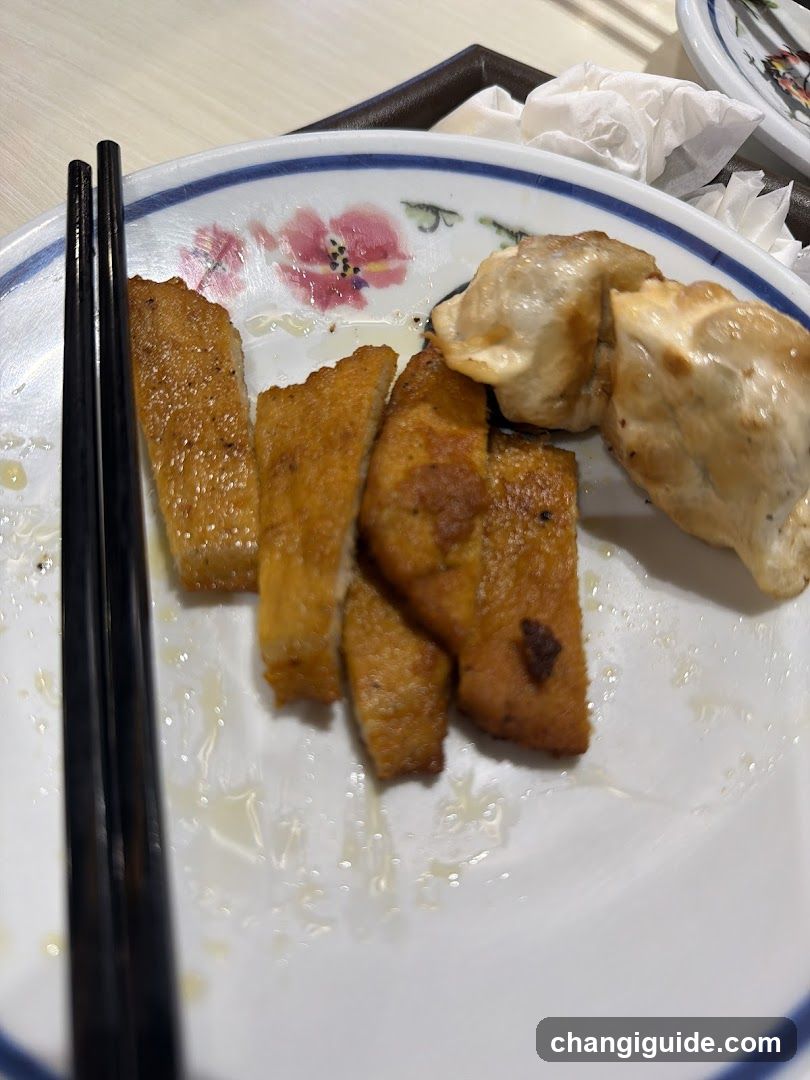 Plate of Fried Food and Dumplings