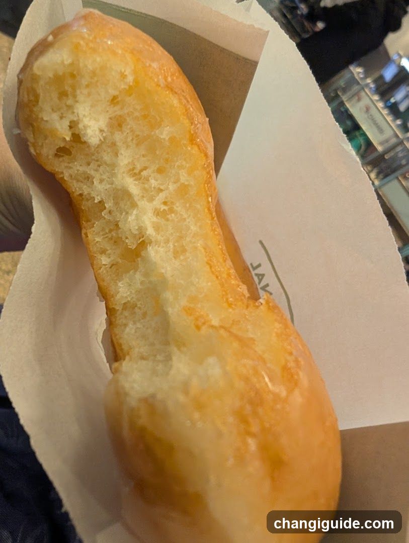 Glazed Donut in Paper Wrapper