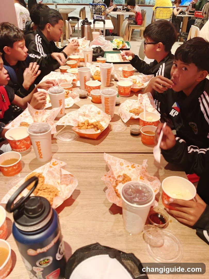 Group eating at Popeyes