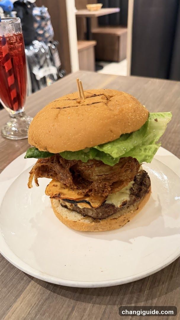 Burger with Fried Onions and Drink