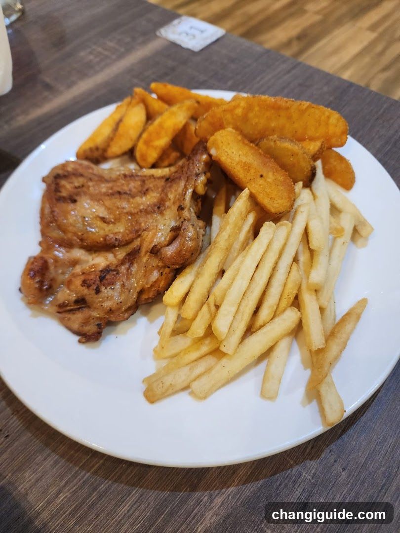 Pork Chop with Fries and Potato Wedges