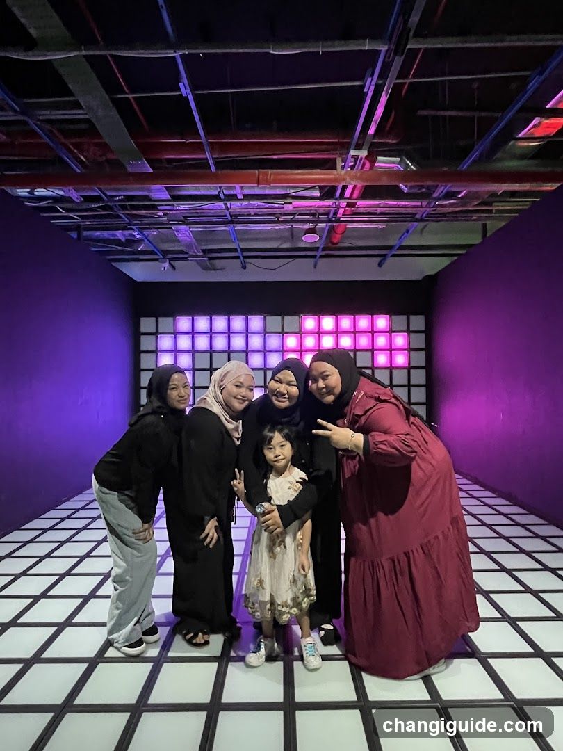 Group Photo in Neon-Lit Room