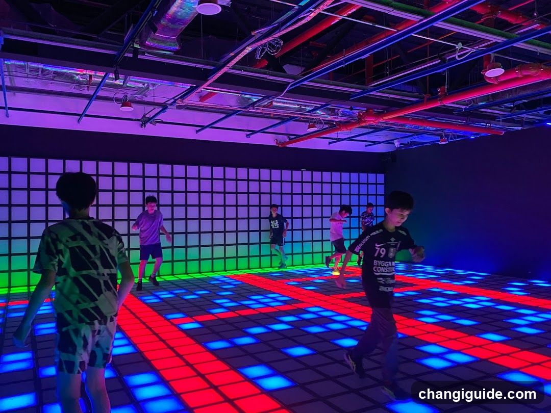 Kids dancing in LED dance floor room