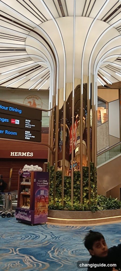 Airport Terminal Interior with Hermes Storefront