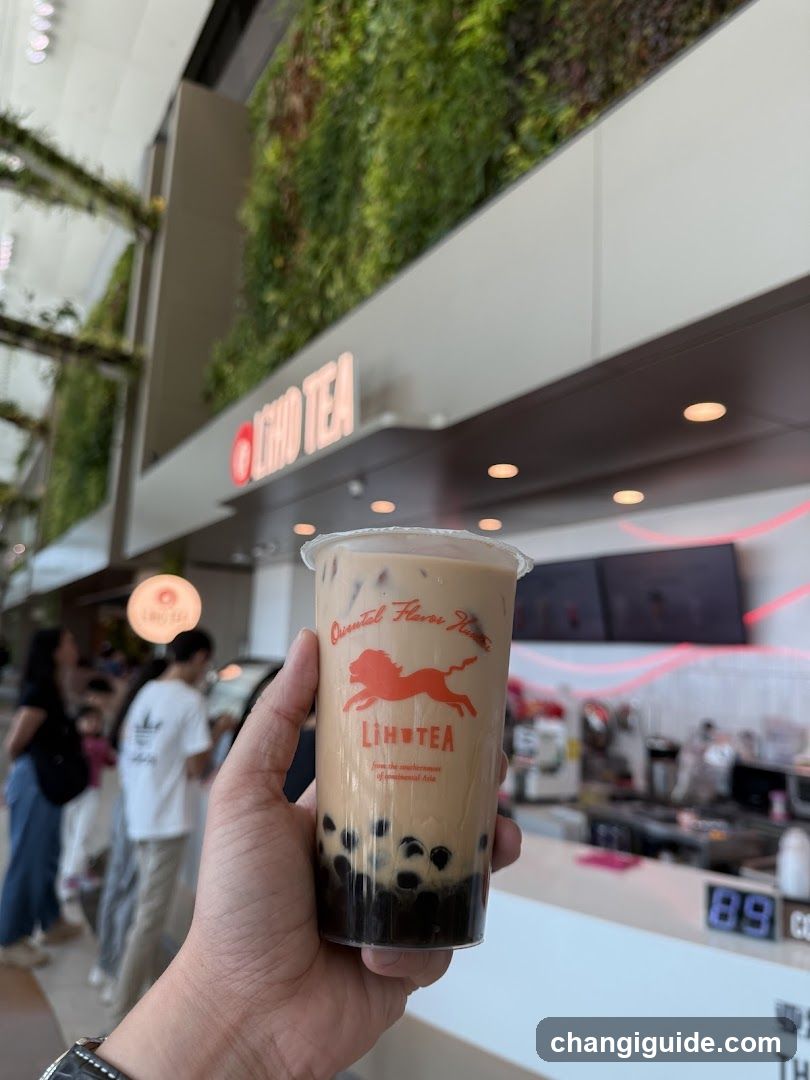 Boba Milk Tea Cup in Front of Shop
