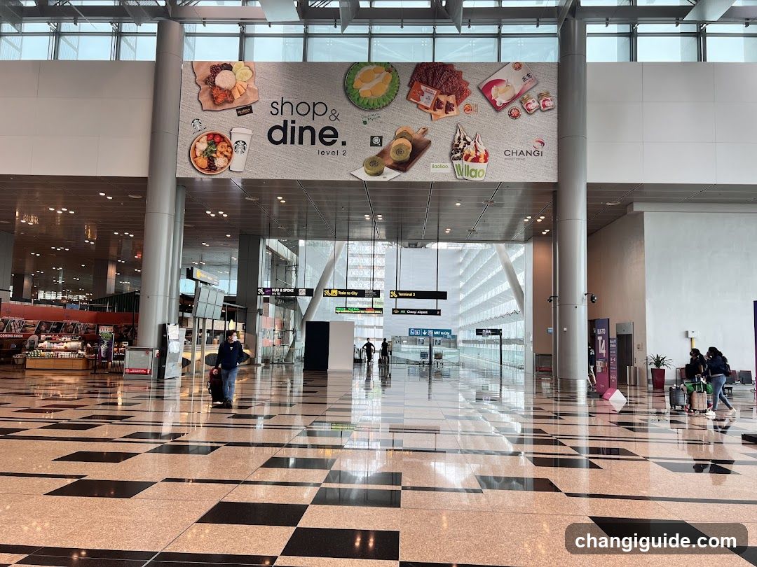 Airport Terminal Interior with Food Court Signage
