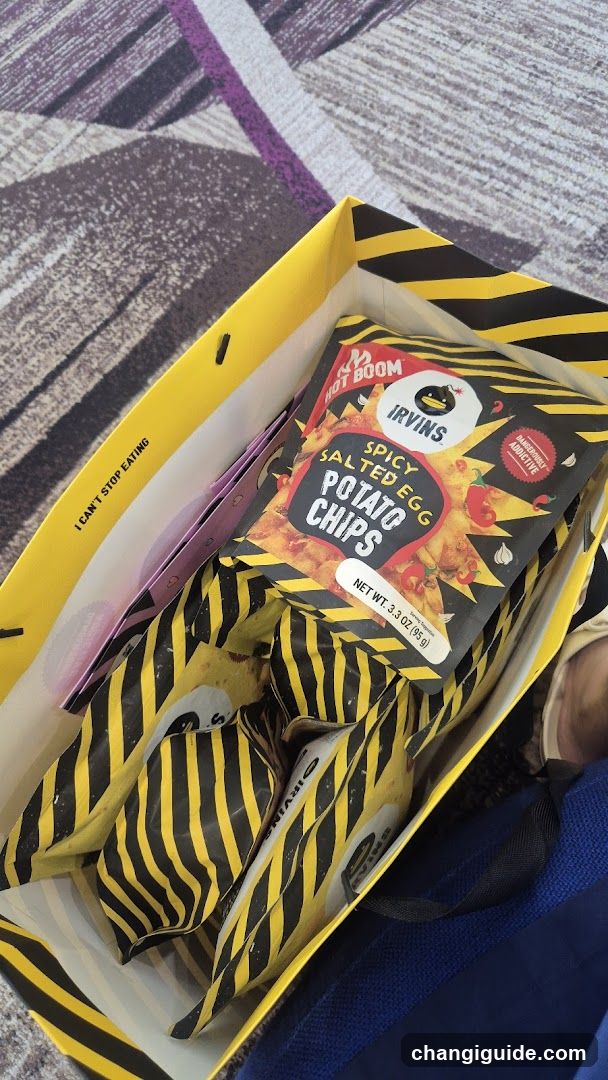 Irvin's Hot Boom Spicy Salted Egg Potato Chips in a shopping bag