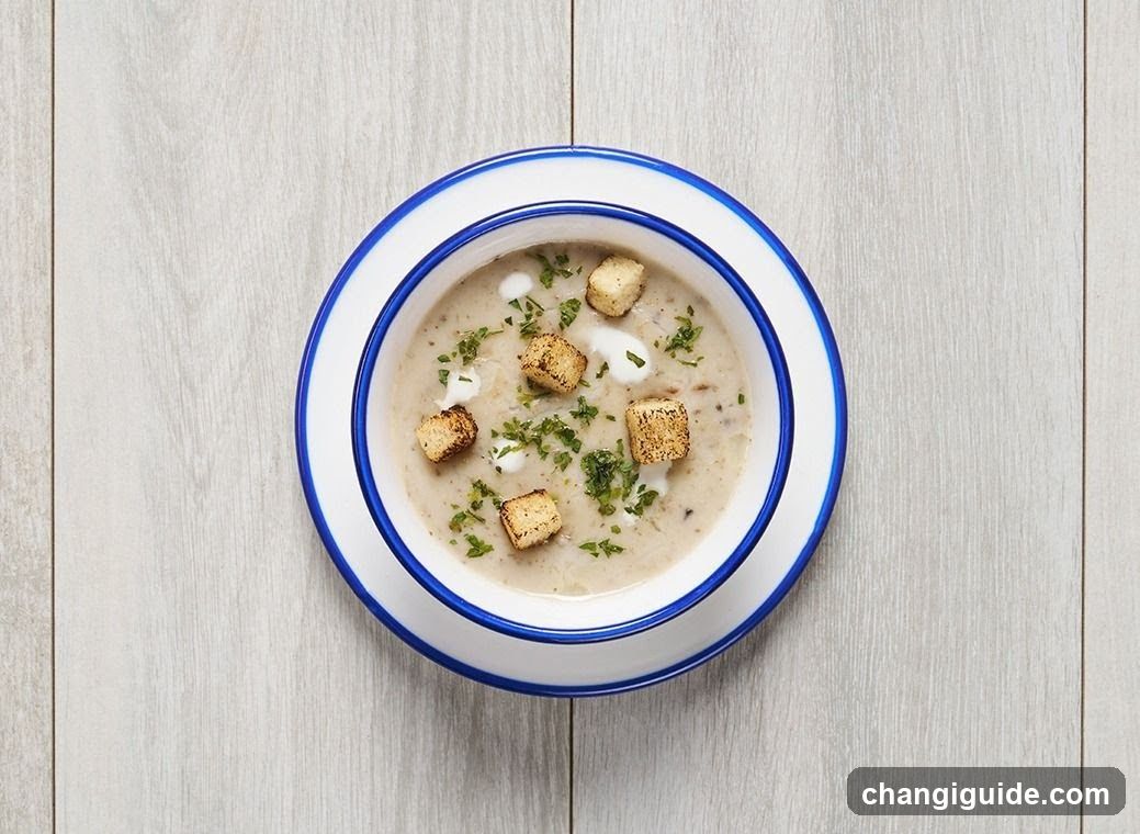Creamy Soup with Croutons and Herbs