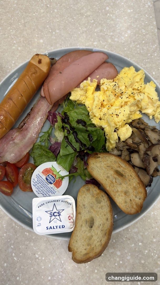 Breakfast Plate with Scrambled Eggs and Sausage
