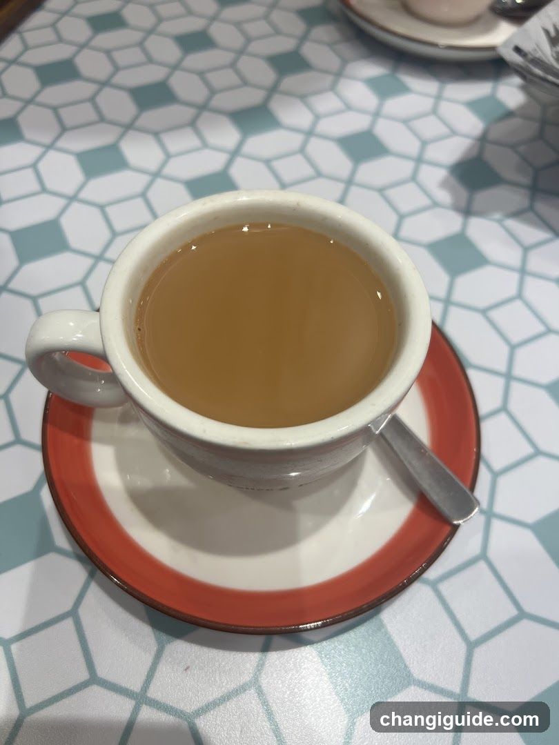 Cup of tea on patterned table