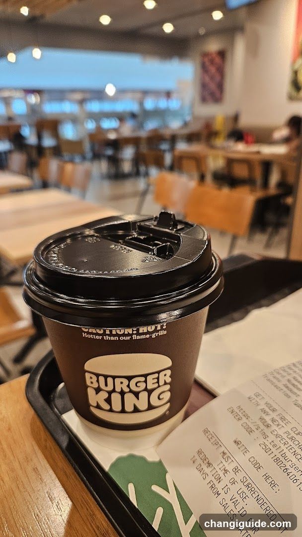 Burger King Coffee Cup in Restaurant Interior