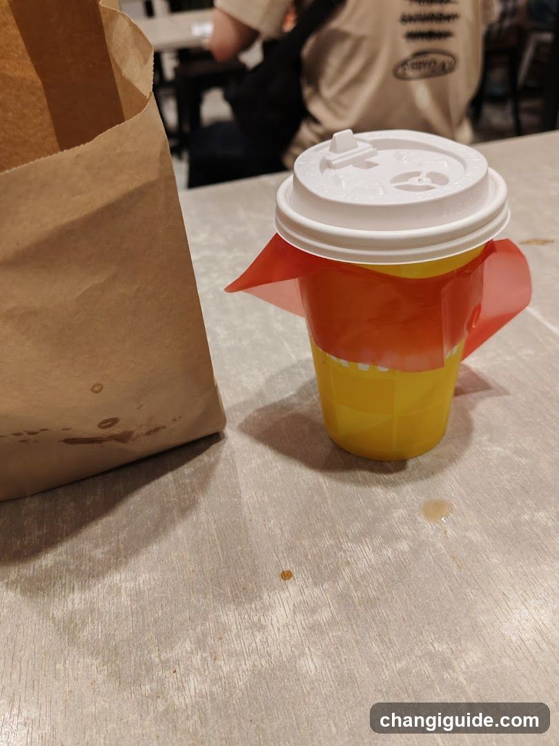 Coffee Cup and Bag on Table