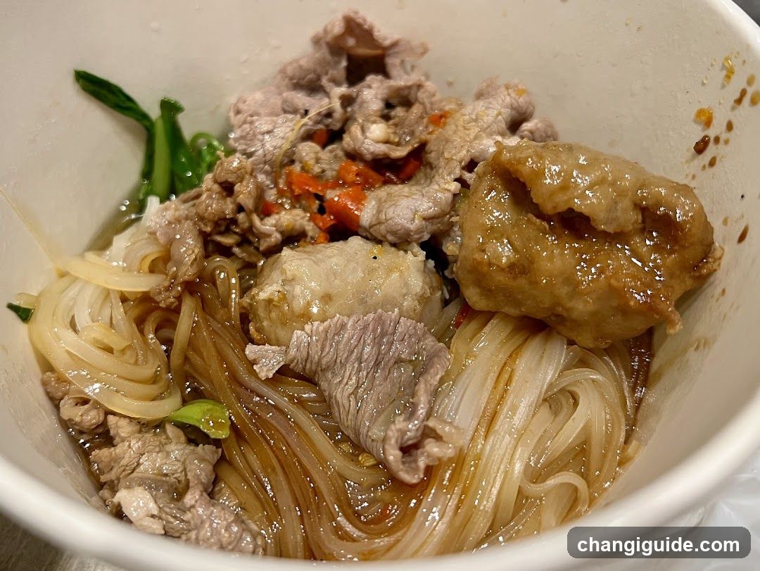 Bowl of Noodles with Meat and Vegetables