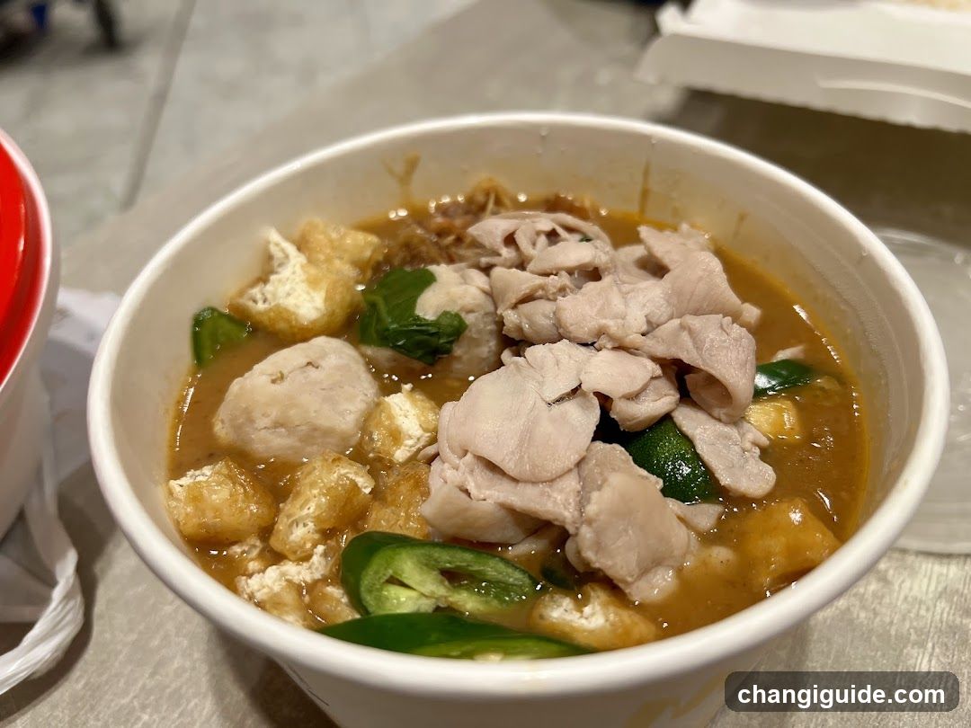 Bowl of Curry with Meat and Vegetables