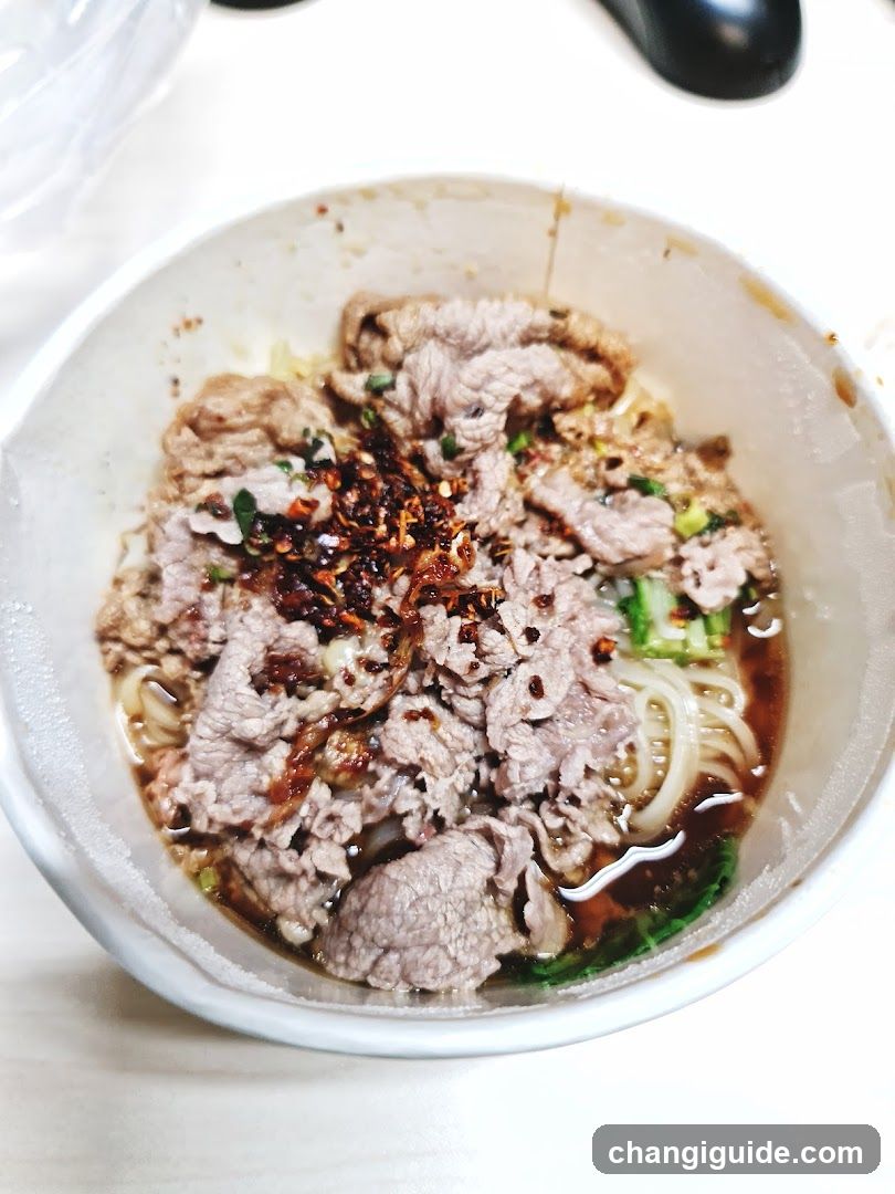 Bowl of Noodles with Meat and Chili Oil