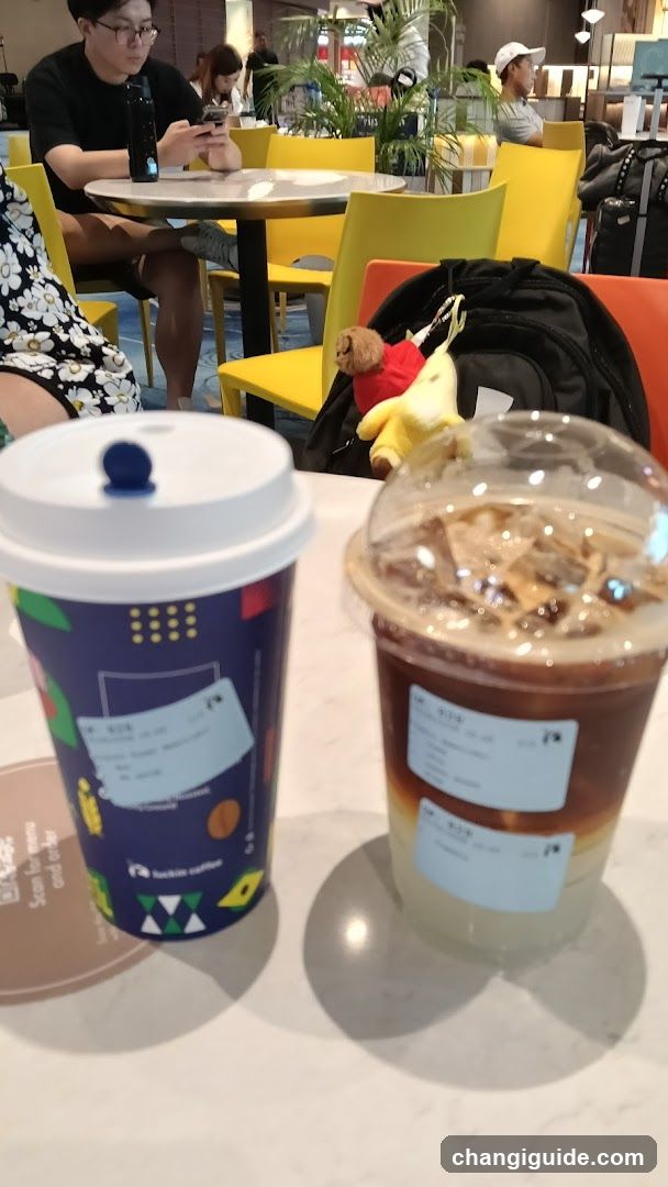 Coffee Shop Interior with Drinks and Customers