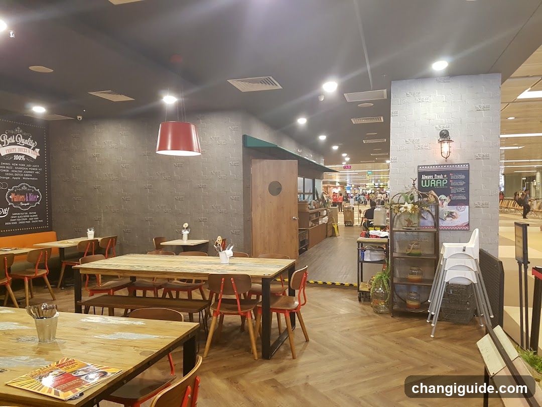 Restaurant Interior with Wooden Tables and Decorative Elements
