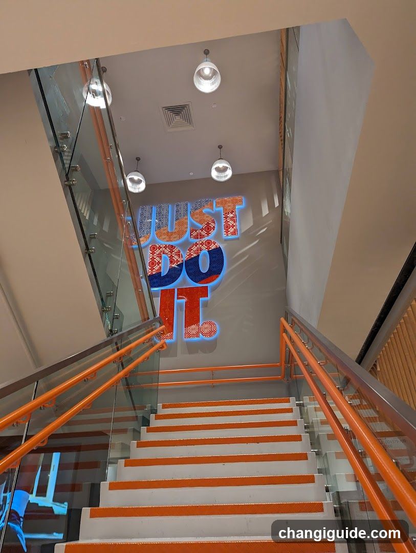 Staircase with 'Just Do It' Signage
