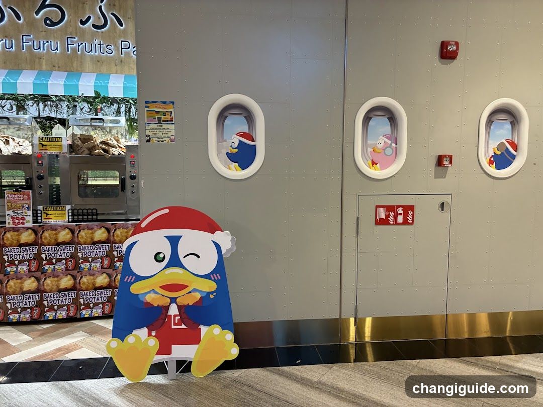 Holiday-themed store display with penguin cutout