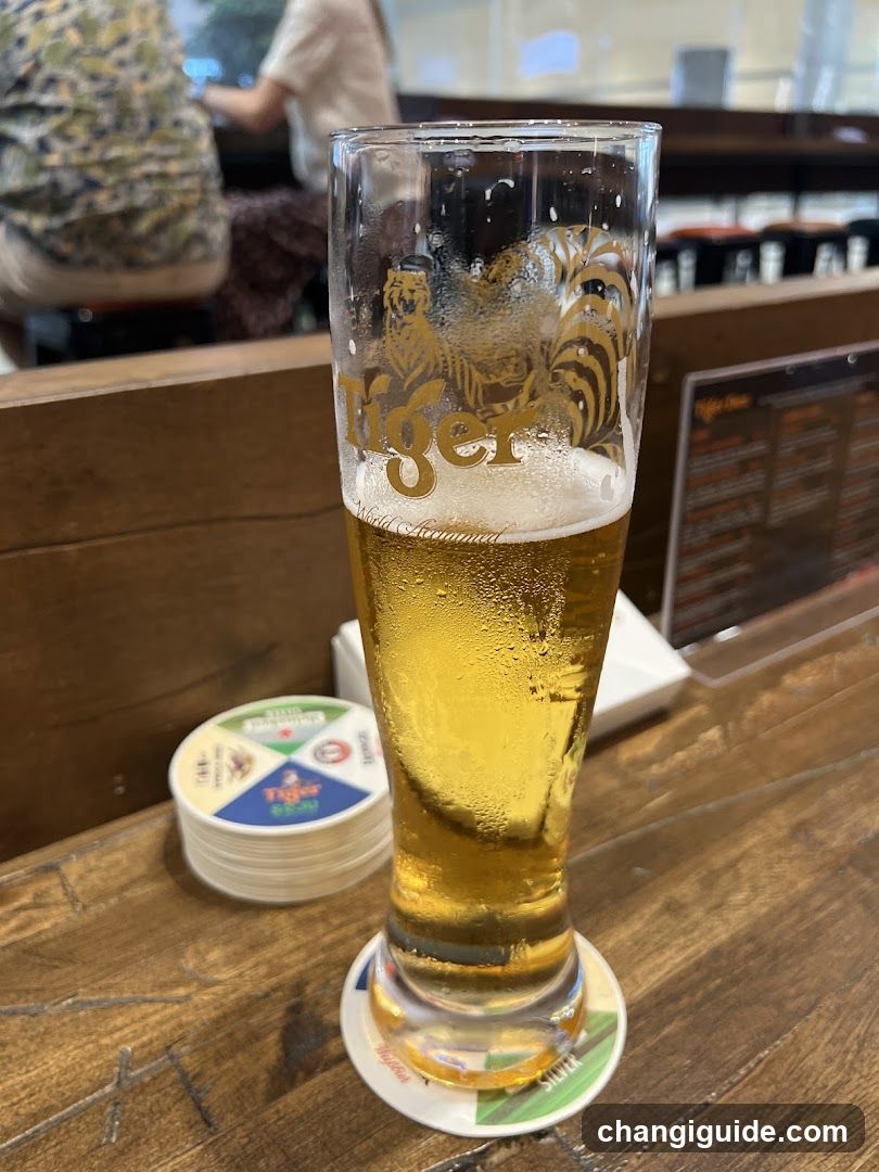 Tiger Beer Glass on Wooden Table