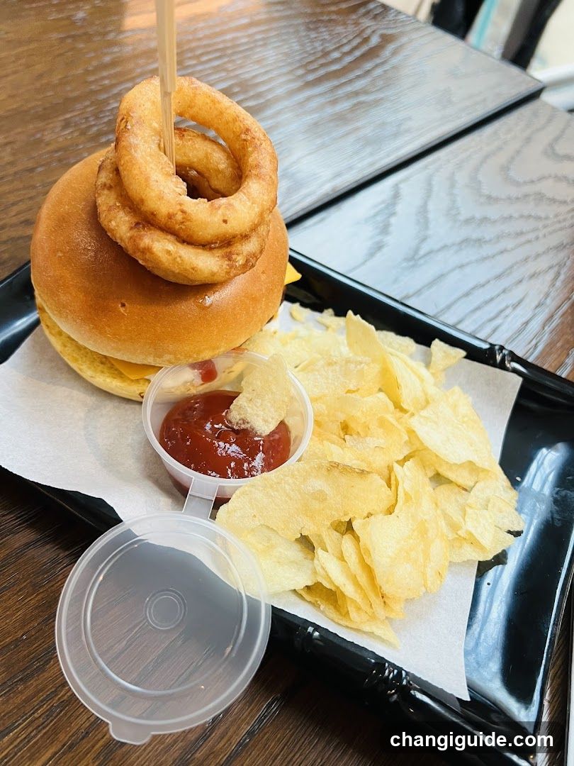 Burger with Onion Rings and Chips