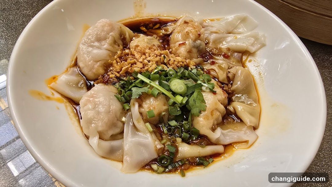 Dumplings with Sauce and Garnish