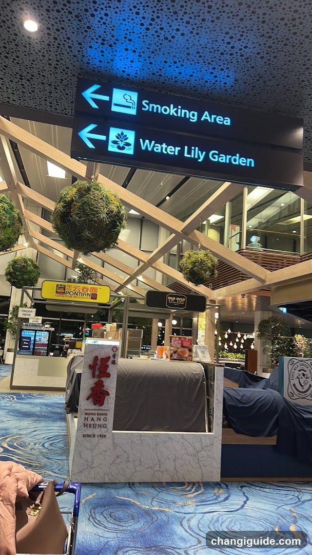 Airport Terminal Interior with Food Stalls and Signage