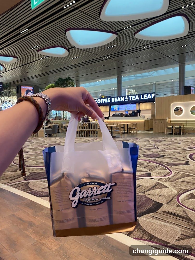 Garrett Popcorn Shop bag in airport terminal