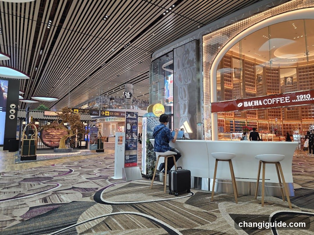 Airport Terminal Interior with Bacha Coffee Kiosk