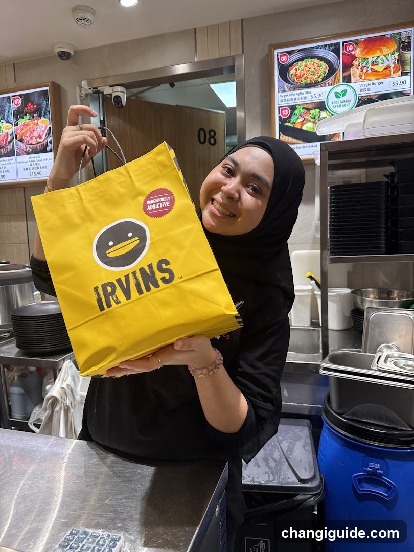Staff holding Irvin's bag