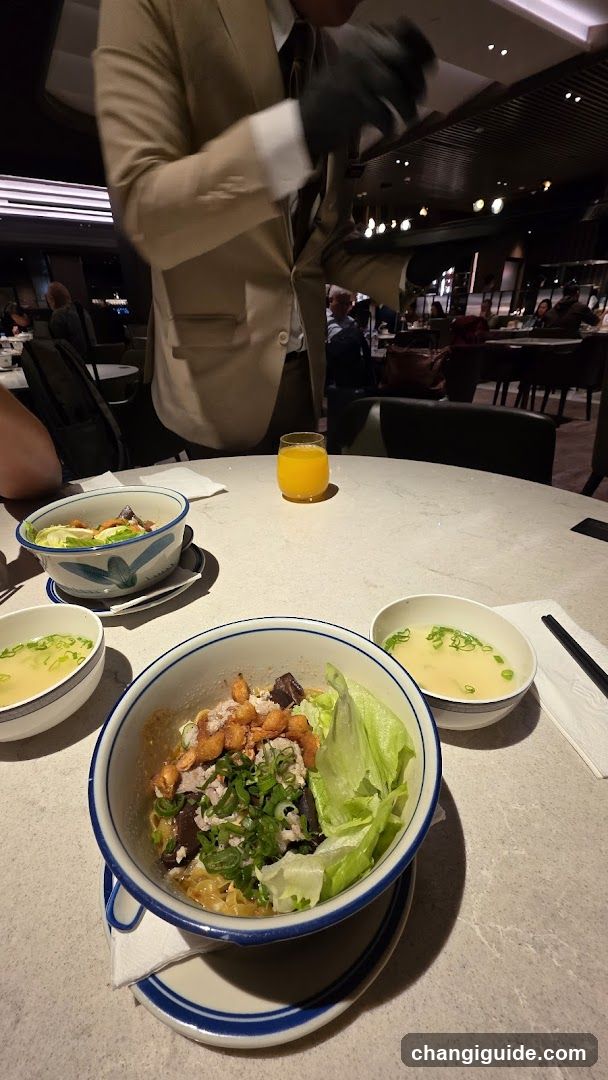 Dining Table with Bowls of Soup and Salad