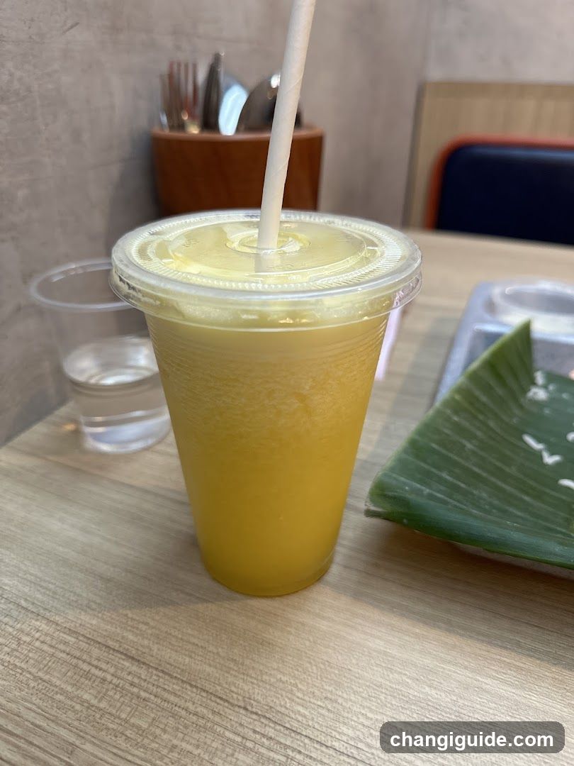 Yellow Juice with Straw