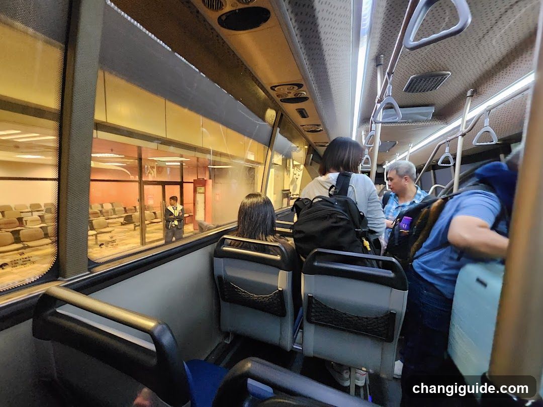 Bus Interior with Passengers and Staff