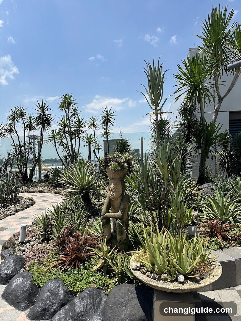 Garden with Statue and Plants
