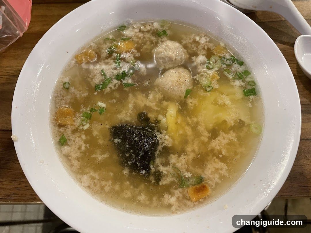 Soup Bowl with Meatballs and Scallions