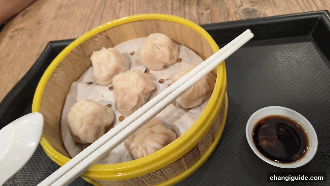 Dim Sum with Chopsticks and Soy Sauce